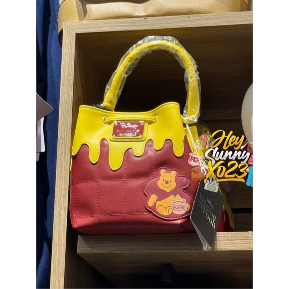 Loungefly Handbags - Loungefly Disney Winnie the Pooh Honey Drip Bucket Crossbody Bag